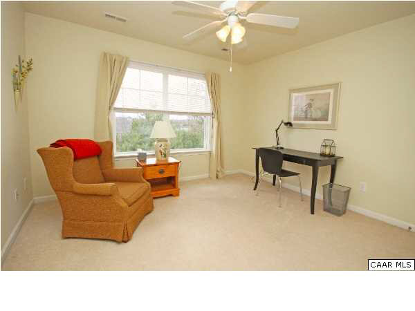 1340 Stoney Ridge Road Charlottesville, VA 22902 - Photo 12 of 14 a living room with furniture and a large window