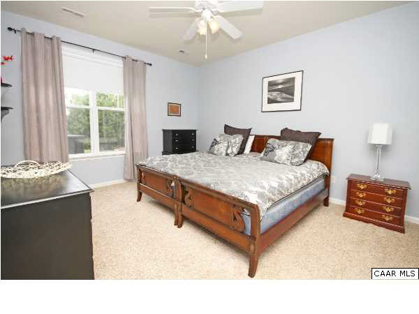 1340 Stoney Ridge Road Charlottesville, VA 22902 - Photo 4 of 14 a bedroom with a bed and window
