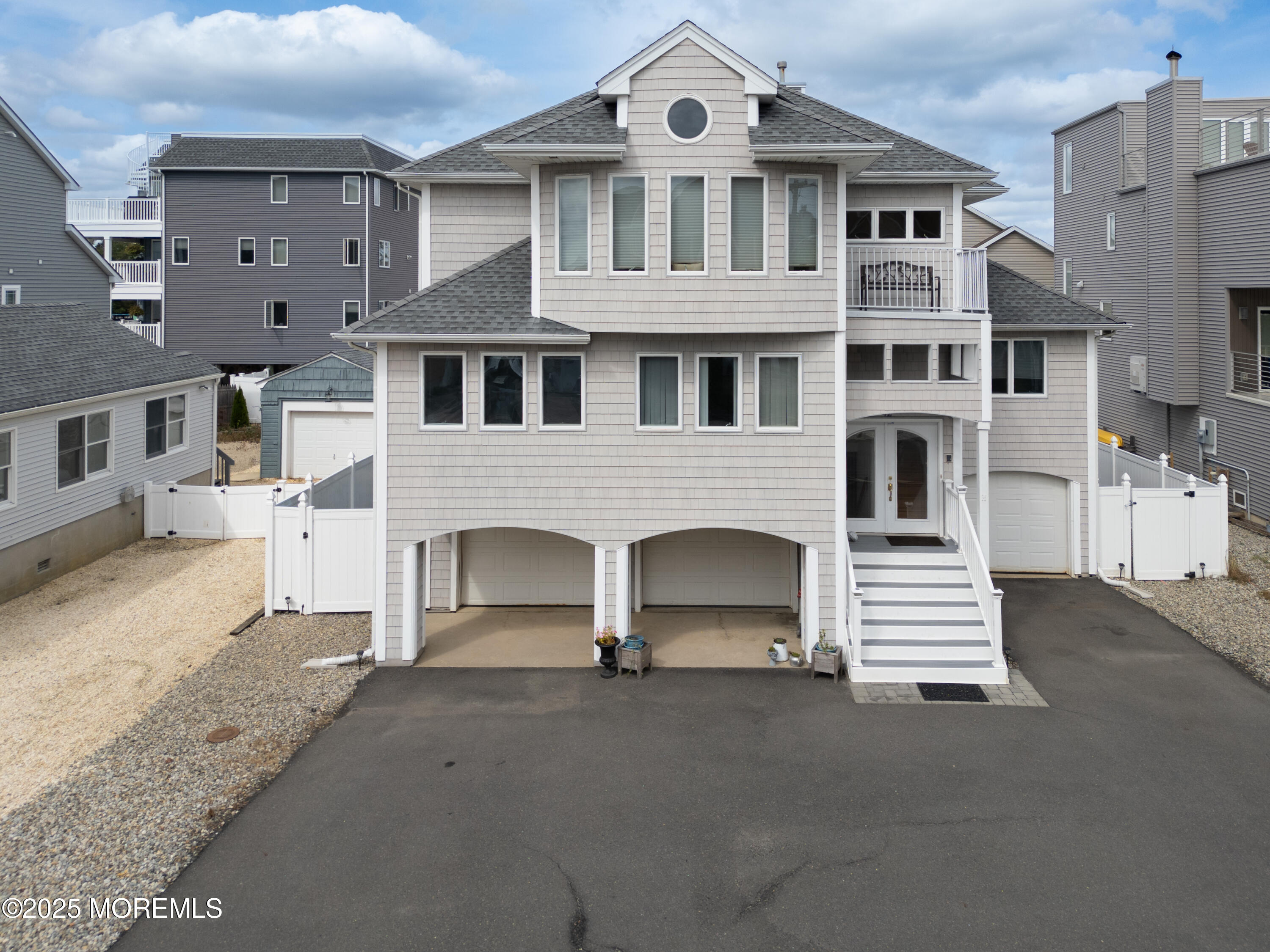 42 Bay Breeze Drive Toms River, NJ 08753 - Photo 1 of 33 a front view of a house with a garage
