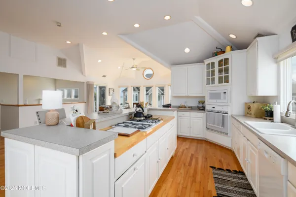 a view of a chair and table in the balcony
