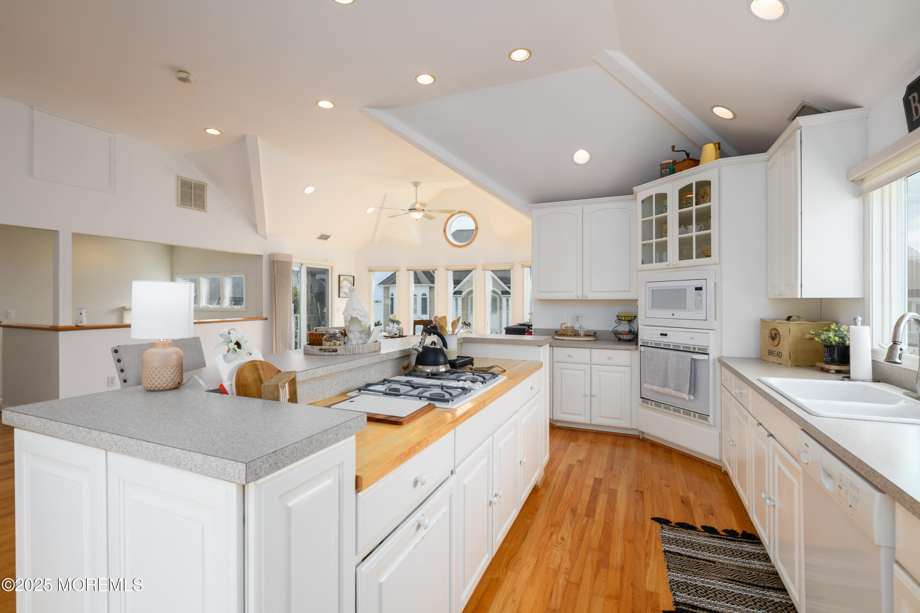 42 Bay Breeze Drive Toms River, NJ 08753 - Photo 23 of 33 a large white kitchen with stainless steel appliances granite countertop lots of counter top space