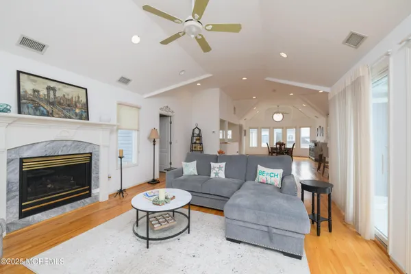 a bathroom with a toilet a sink and a mirror