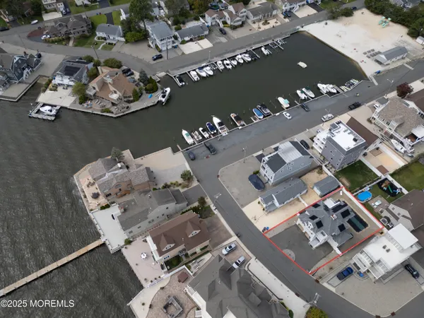 an aerial view of a house with wooden floor