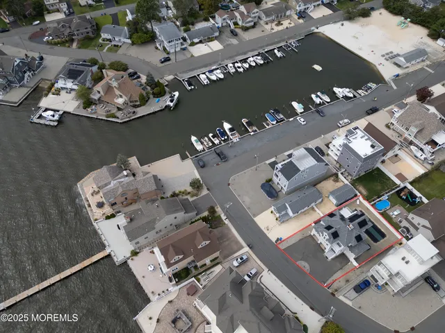 an aerial view of a house with wooden floor