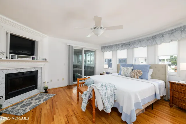 a balcony with furniture and a potted plant