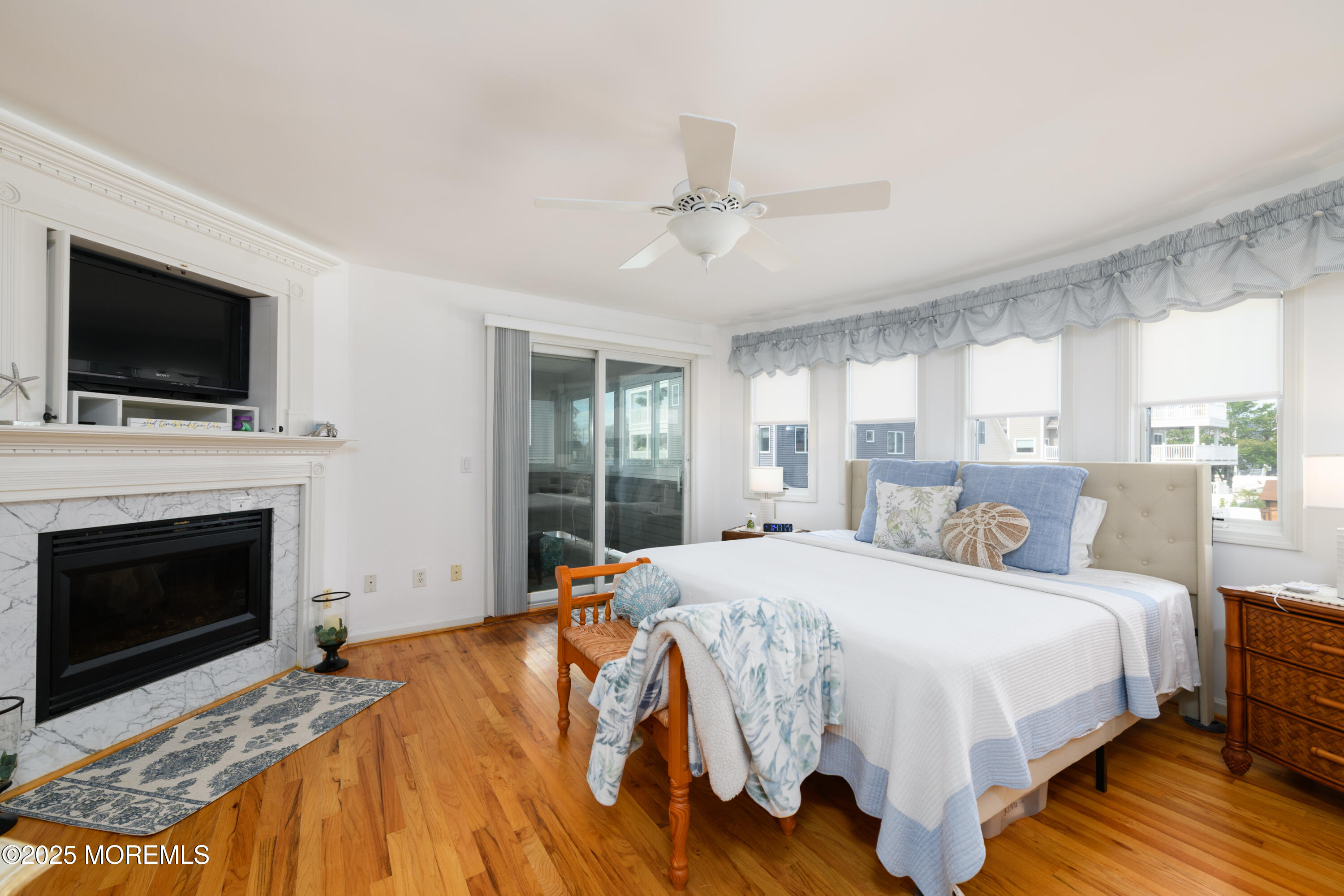 42 Bay Breeze Drive Toms River, NJ 08753 - Photo 8 of 33 a bedroom with a bed and a flat screen tv