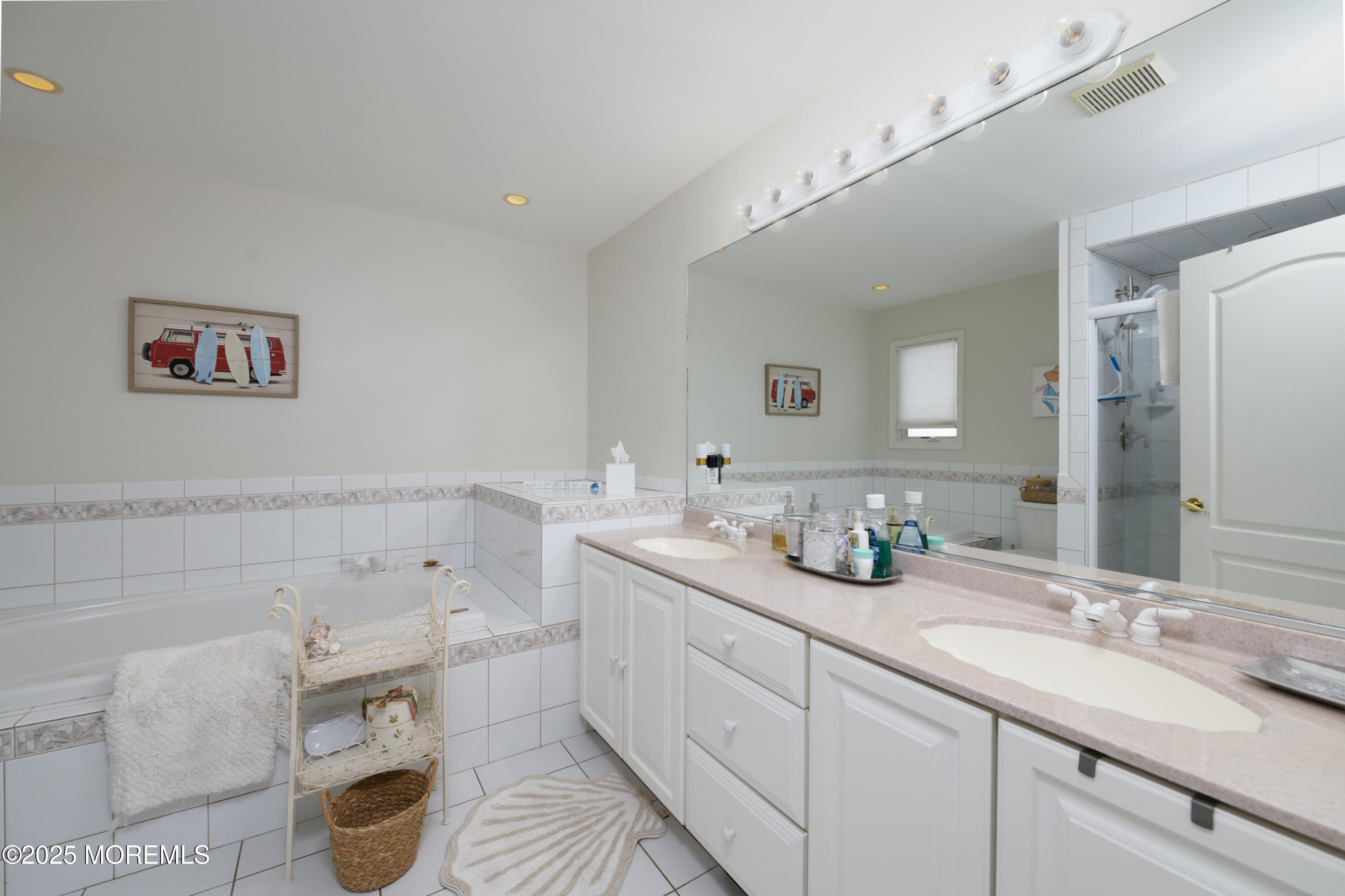 42 Bay Breeze Drive Toms River, NJ 08753 - Photo 10 of 33 a spacious bathroom with a granite countertop sink mirror and a
