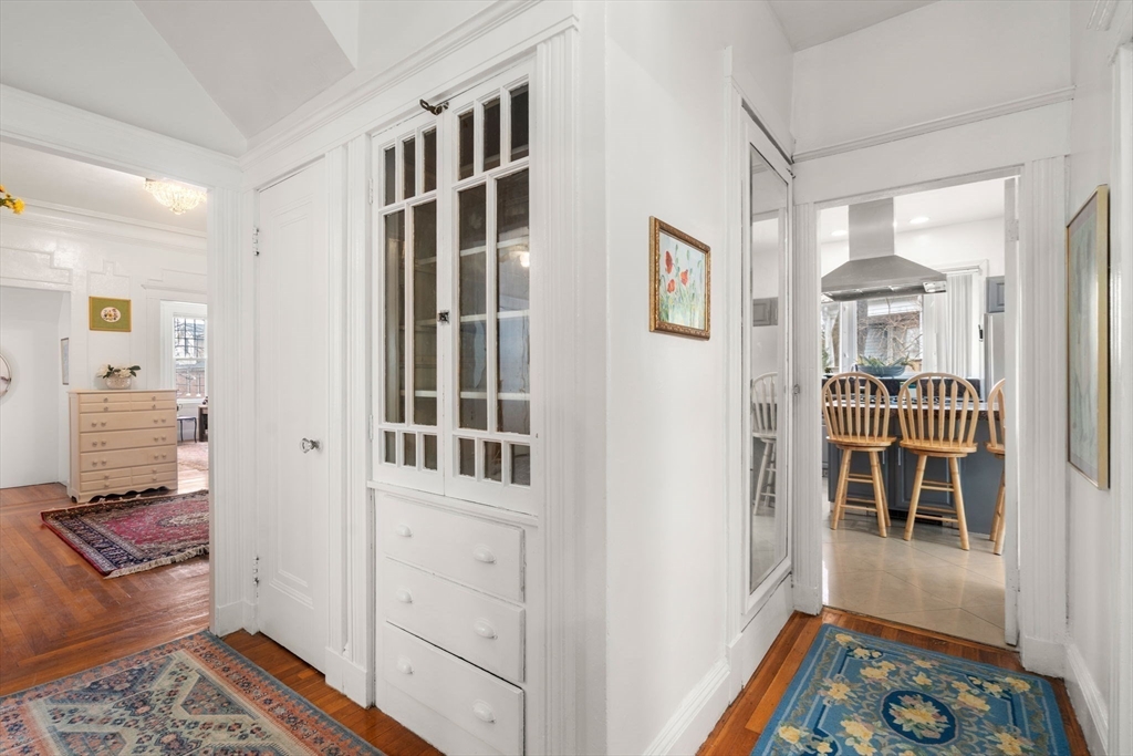 21 Colbourne Crescent, Unit 1 Brookline, MA 02445 - Photo 17 of 35 a living room with furniture and a rug
