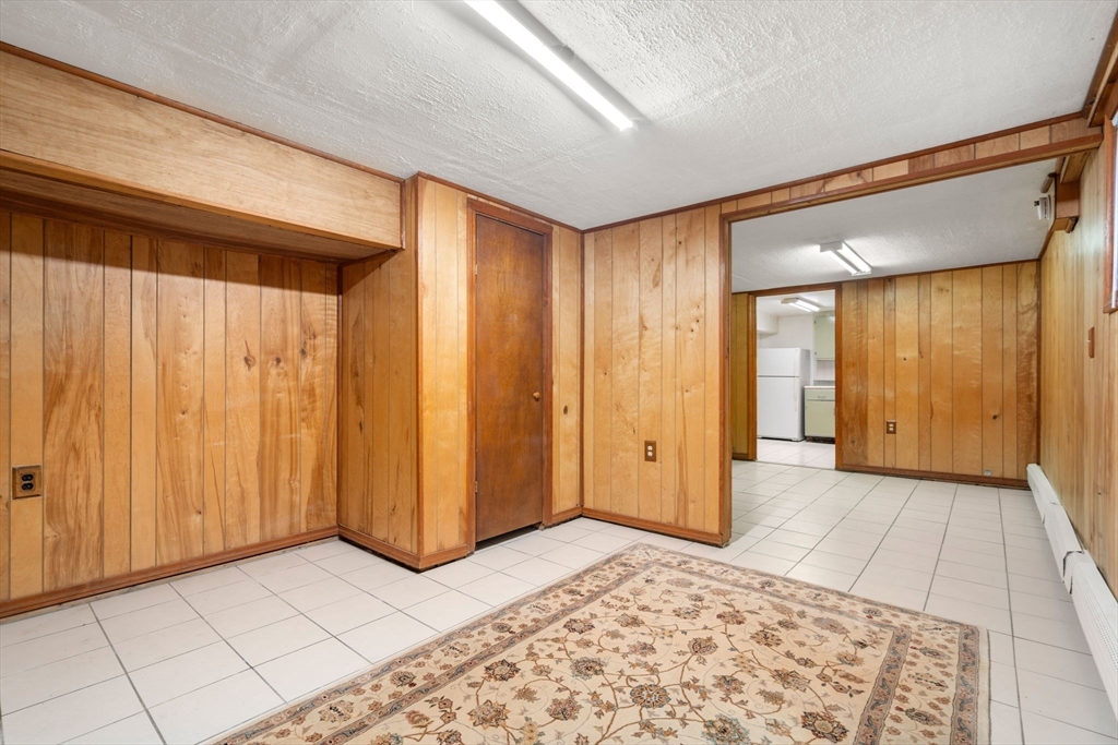 21 Colbourne Crescent, Unit 1 Brookline, MA 02445 - Photo 19 of 35 a view of a room with an empty space and entrance