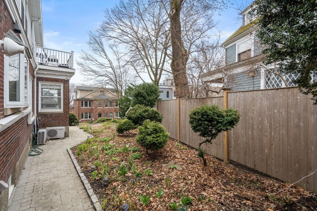 21 Colbourne Crescent, Unit 1 Brookline, MA 02445 - Photo 31 of 35 a view of a house with a yard