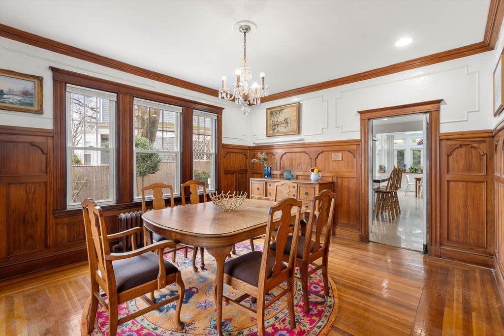 21 Colbourne Crescent, Unit 1 Brookline, MA 02445 - Photo 6 of 35 a dining room with furniture window and wooden floor