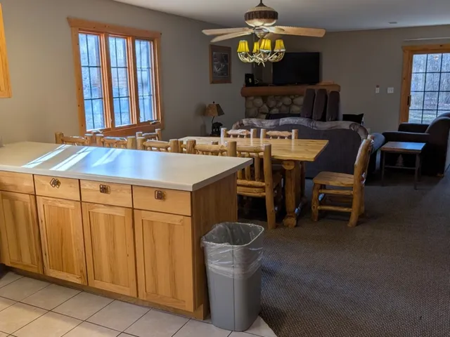 a kitchen with a sink stove and microwave