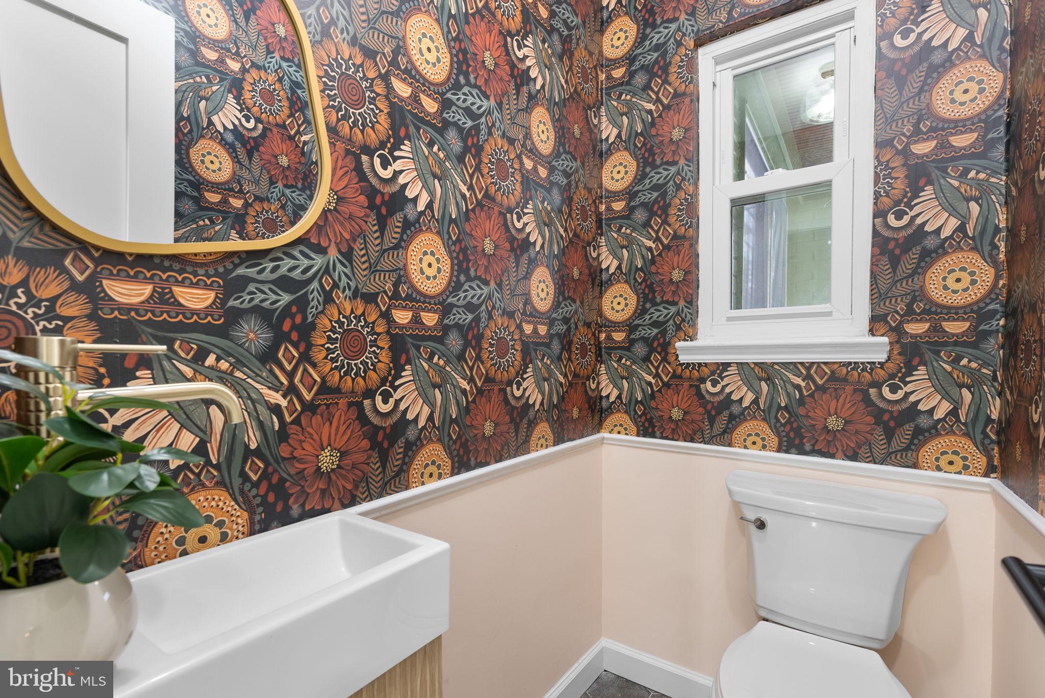 6328 North Capitol Street Northwest Washington, DC 20011 - Photo 11 of 34 a bathroom with a toilet and a sink