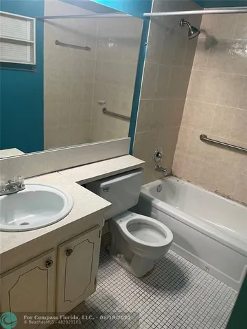 a bathroom with a shower and a bathtub