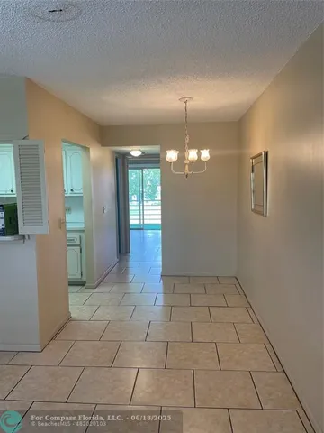a view of a livingroom with a chandelier