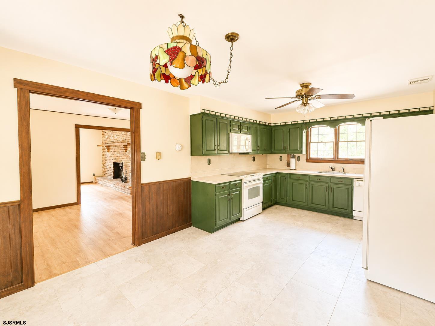 40 Old New York Road Galloway Township, NJ 08205 - Photo 5 of 18 a kitchen with a cabinets and chandelier