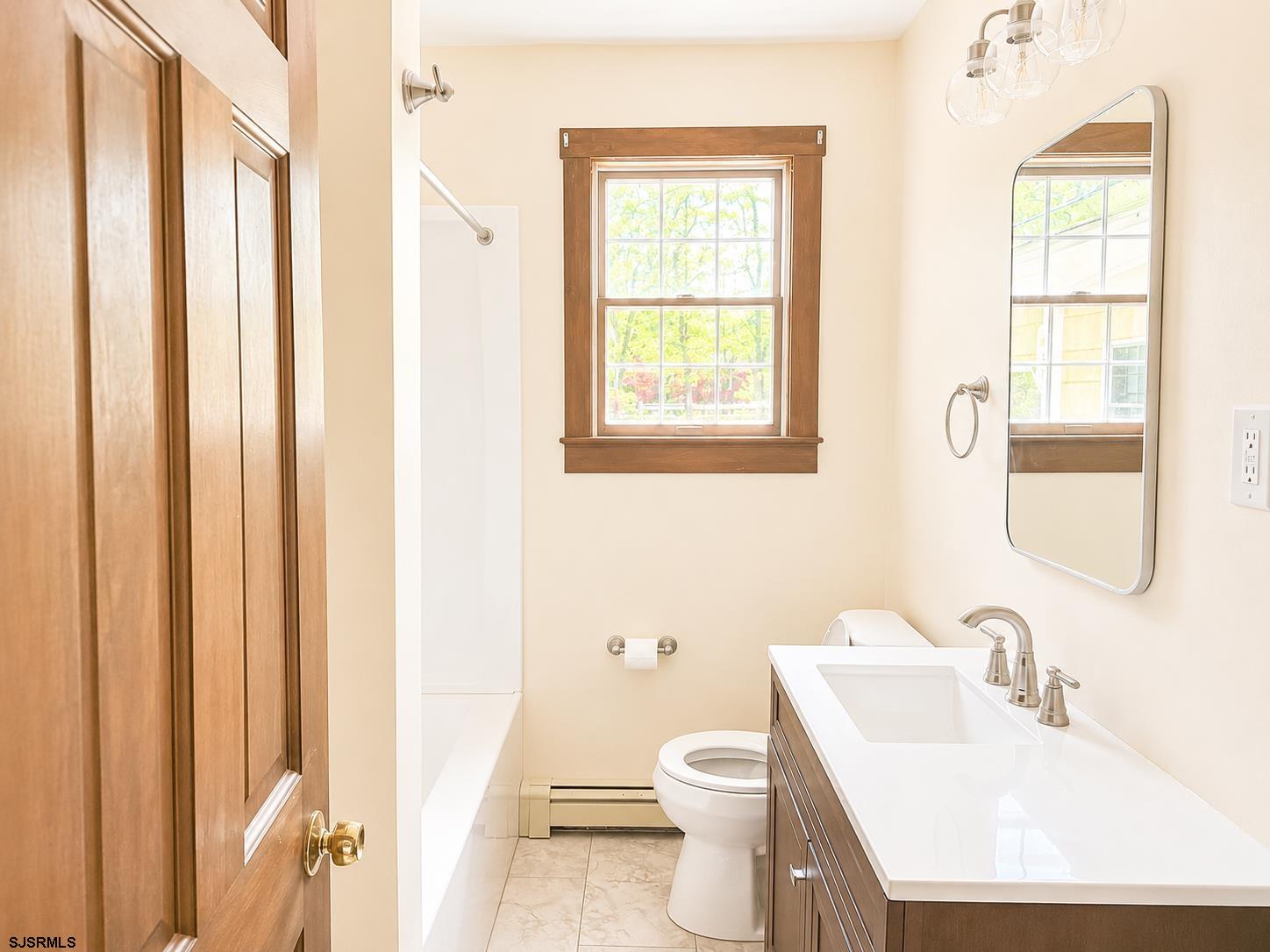 40 Old New York Road Galloway Township, NJ 08205 - Photo 8 of 18 a bathroom with a sink toilet and shower