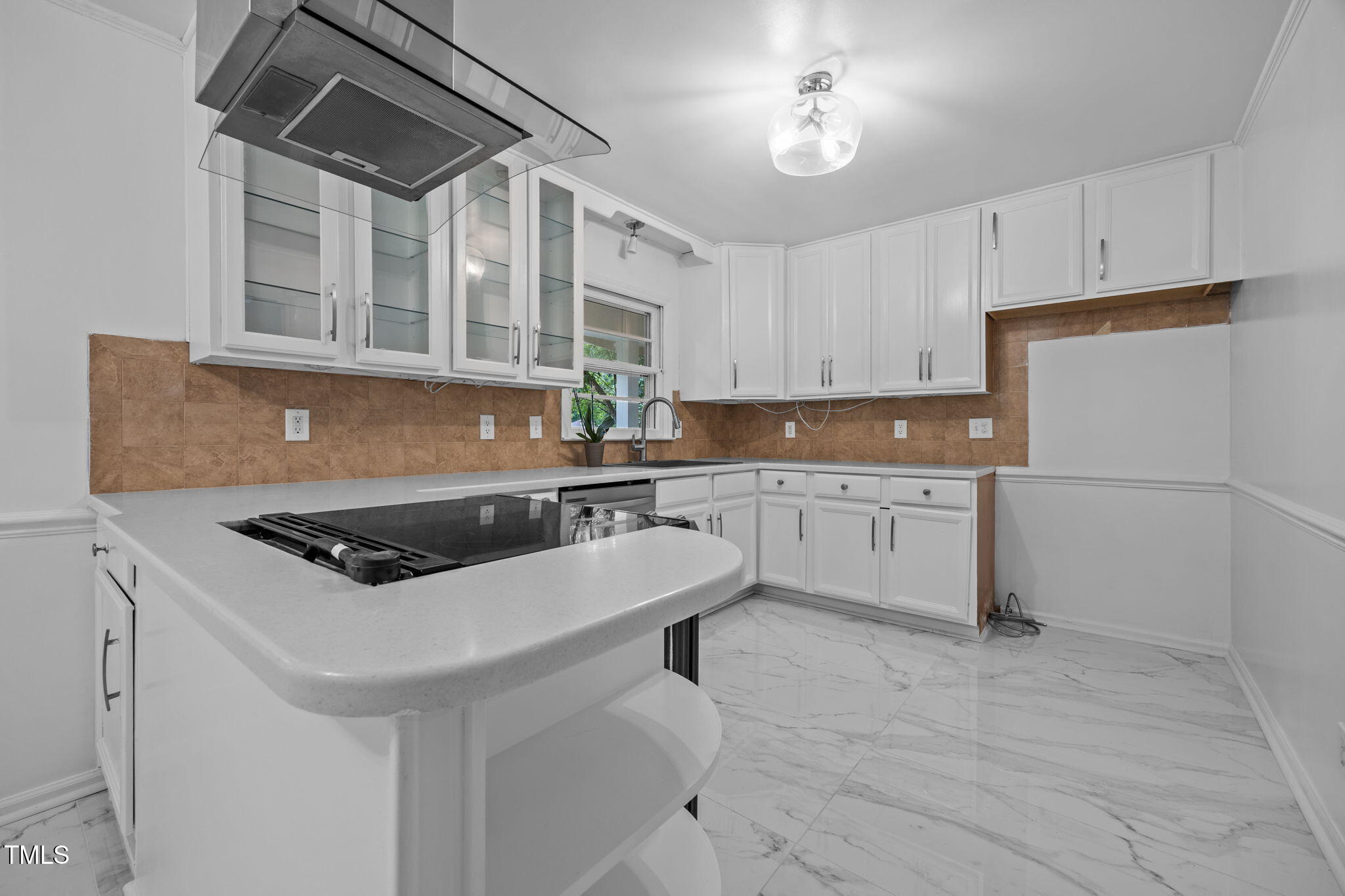 131 Creech Road Garner, NC 27529 - Photo 11 of 29 a kitchen with stainless steel appliances granite countertop a sink stove and refrigerator