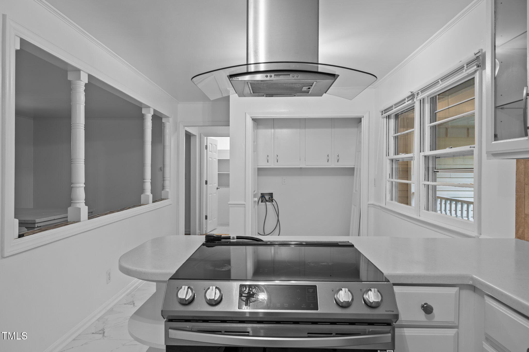 131 Creech Road Garner, NC 27529 - Photo 13 of 29 a view of a kitchen with a sink and cabinets