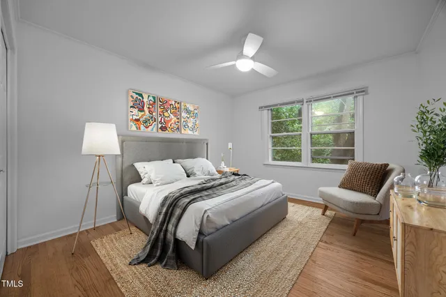 a bedroom with a bed and a couch