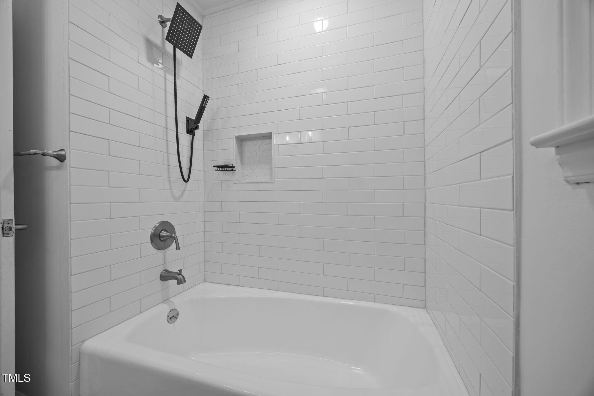 131 Creech Road Garner, NC 27529 - Photo 20 of 29 a close view of a bathtub in bathroom