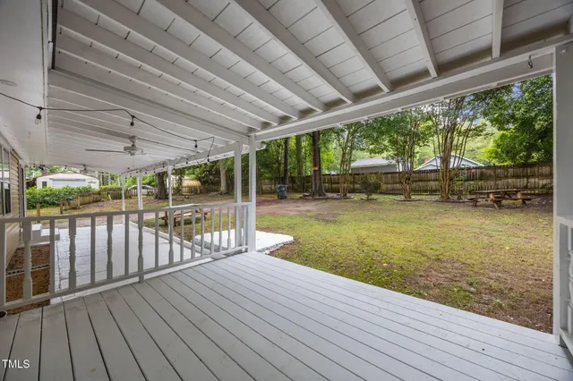 a view of a park with large trees