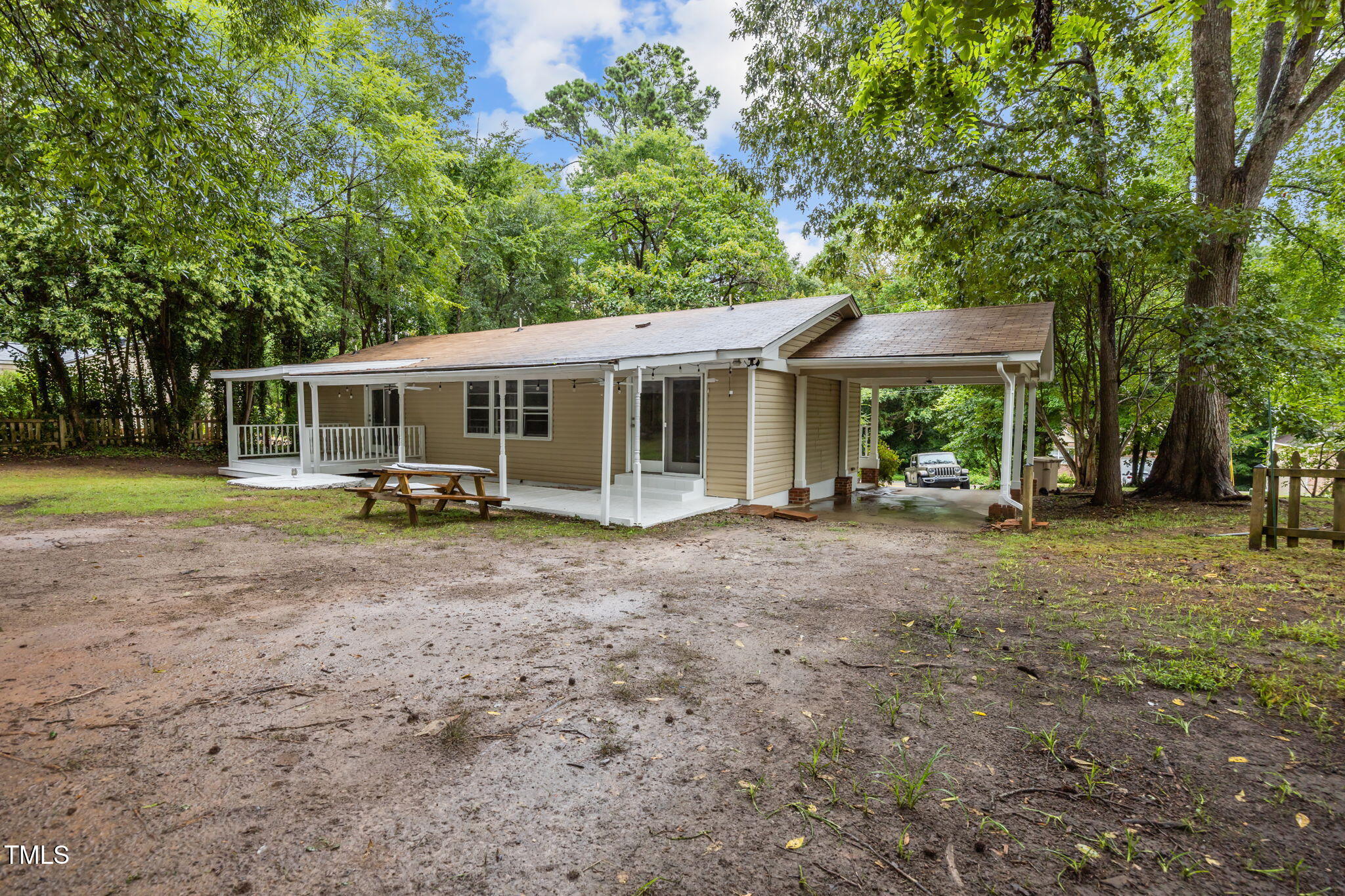 131 Creech Road Garner, NC 27529 - Photo 28 of 29 front view of a house with a yard patio and swimming pool