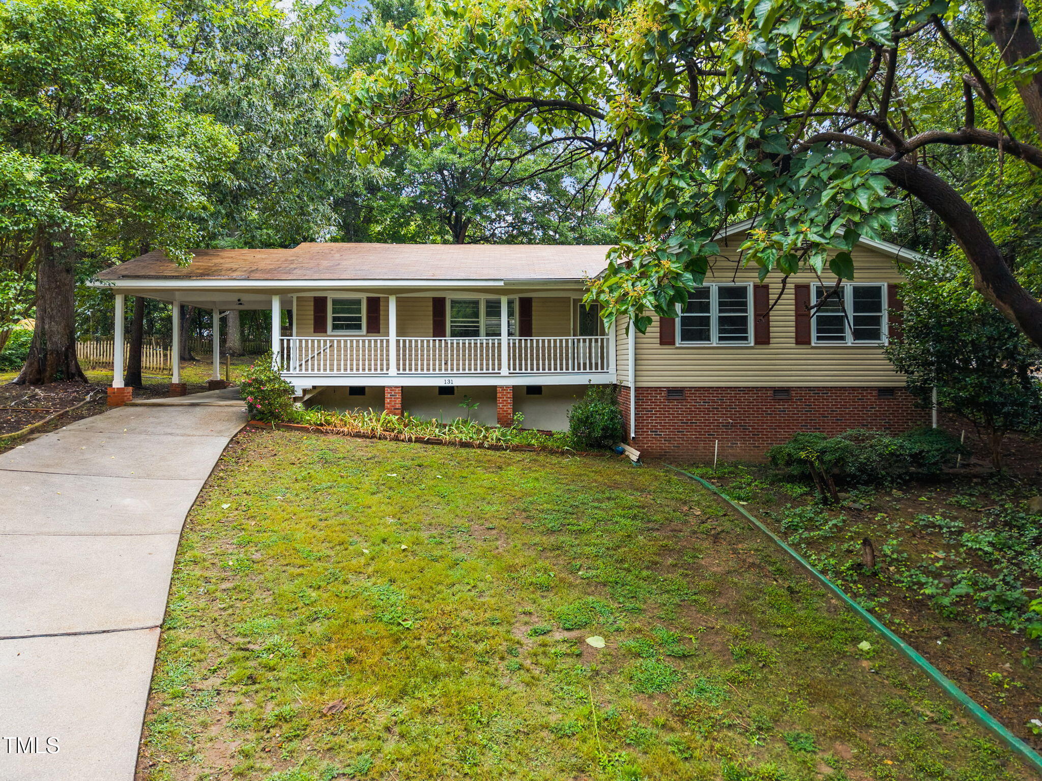131 Creech Road Garner, NC 27529 - Photo 3 of 29 a view of a house with a yard