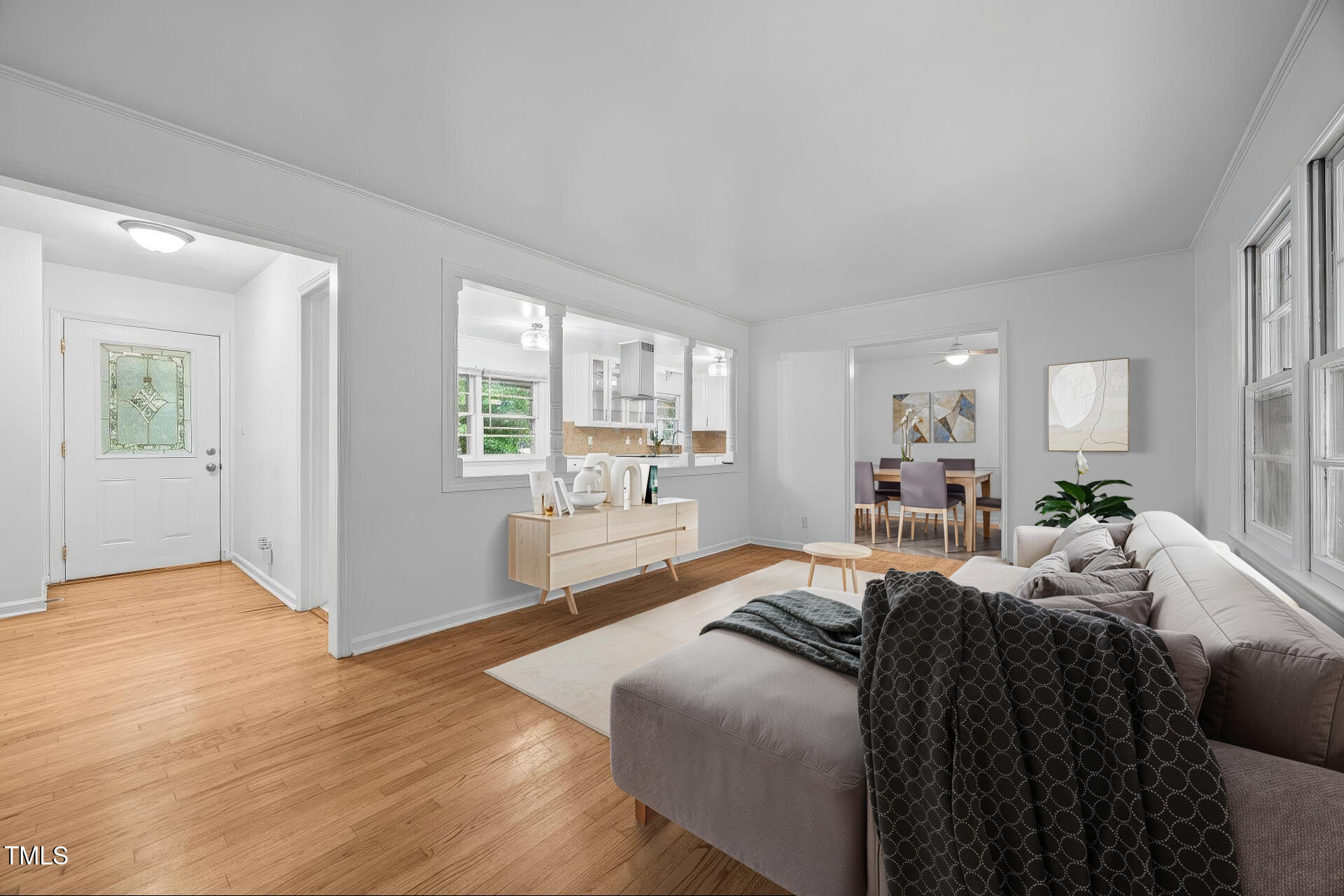 131 Creech Road Garner, NC 27529 - Photo 6 of 29 a large bedroom with a bed and wooden floor