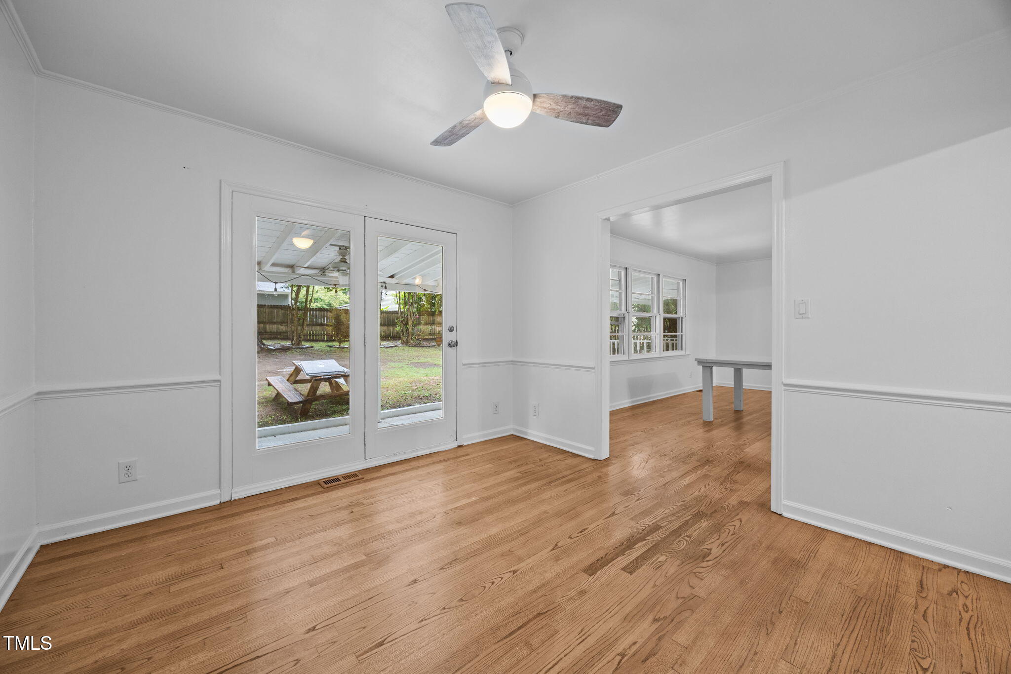 131 Creech Road Garner, NC 27529 - Photo 10 of 29 wooden floor in an empty room with a window