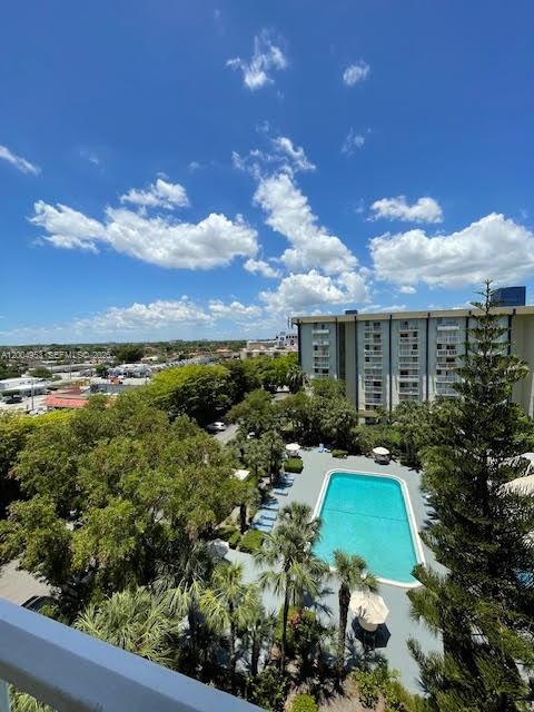 4550 Northwest 9th Street, Unit 803E Miami, FL 33126 - Photo 1 of 31 a view of a house with a garden
