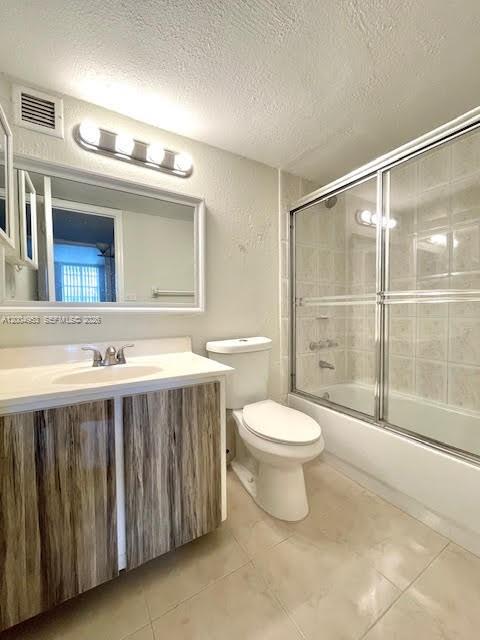 4550 Northwest 9th Street, Unit 803E Miami, FL 33126 - Photo 17 of 31 a bathroom with a sink a toilet and shower