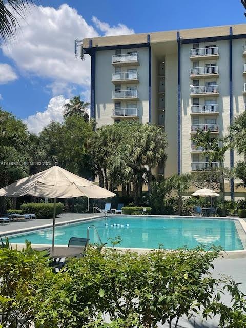 4550 Northwest 9th Street, Unit 803E Miami, FL 33126 - Photo 23 of 31 a garden view with a seating space