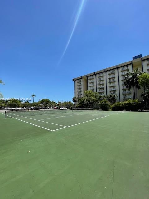 4550 Northwest 9th Street, Unit 803E Miami, FL 33126 - Photo 25 of 31 a view of a large building with a big yard