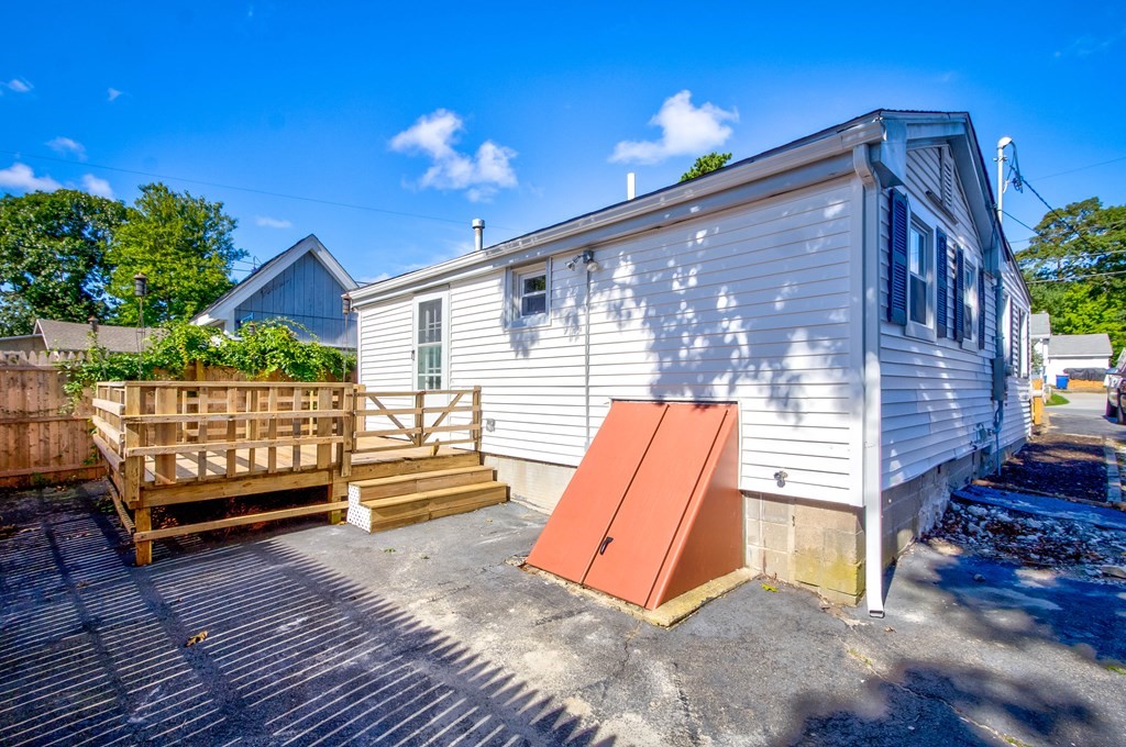 14 Pinehurst Drive Wareham, MA 02571 - Photo 11 of 39 a view of outdoor space with deck and a garden