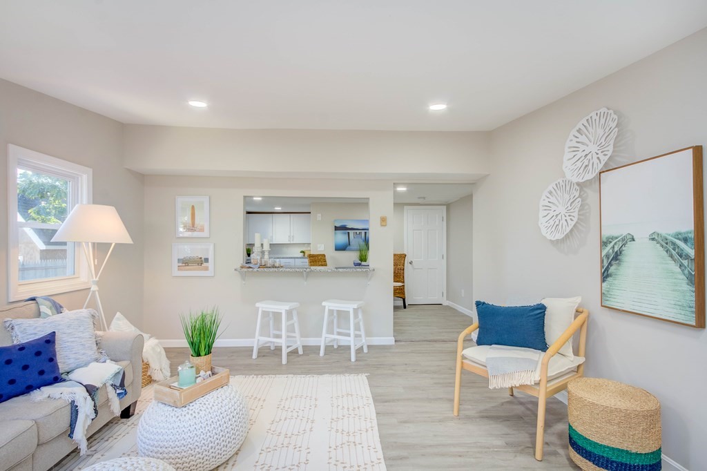 14 Pinehurst Drive Wareham, MA 02571 - Photo 17 of 39 a living room with furniture and a potted plant
