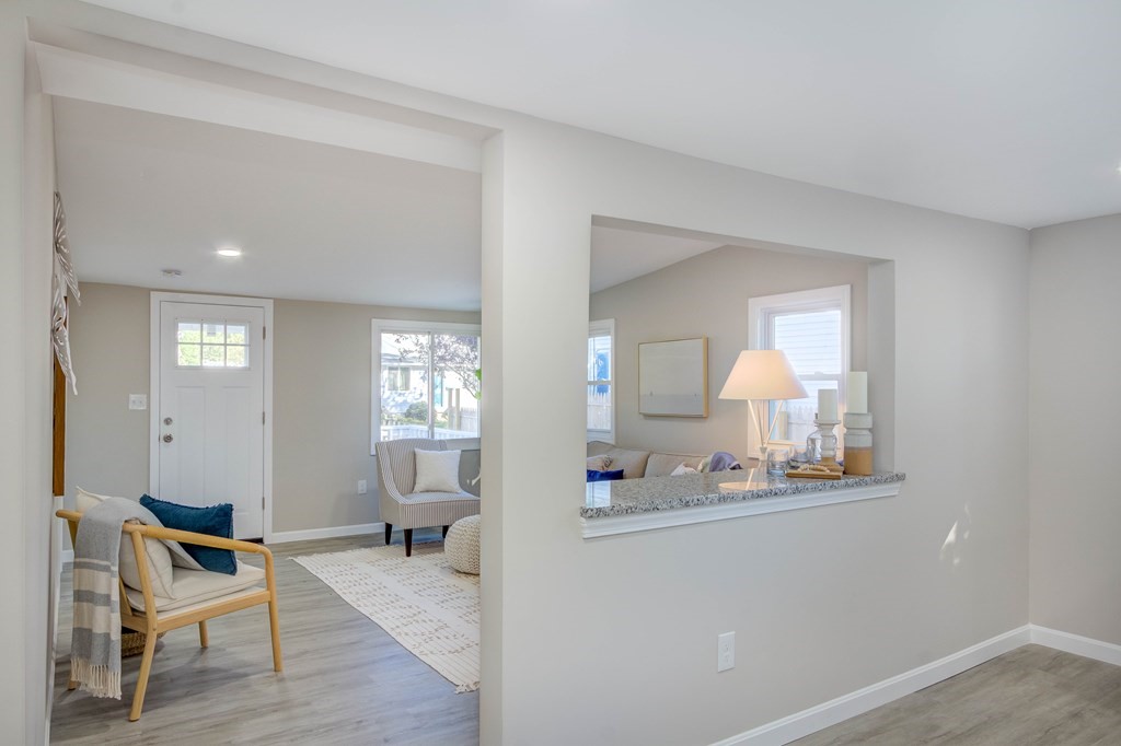 14 Pinehurst Drive Wareham, MA 02571 - Photo 24 of 39 a view of a livingroom with furniture and wooden floor