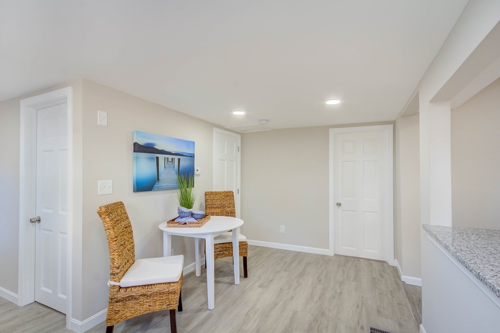 14 Pinehurst Drive Wareham, MA 02571 - Photo 26 of 39 a living room with furniture and a wooden floor