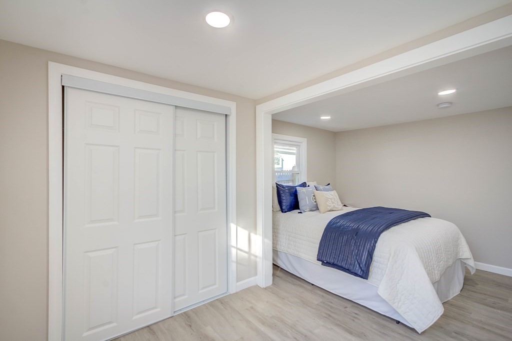 14 Pinehurst Drive Wareham, MA 02571 - Photo 33 of 39 a bedroom with a bed and window