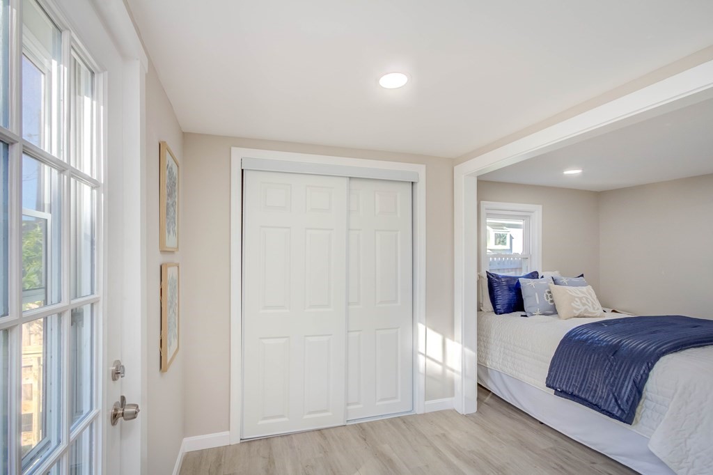 14 Pinehurst Drive Wareham, MA 02571 - Photo 34 of 39 a bedroom with a large bed and a window