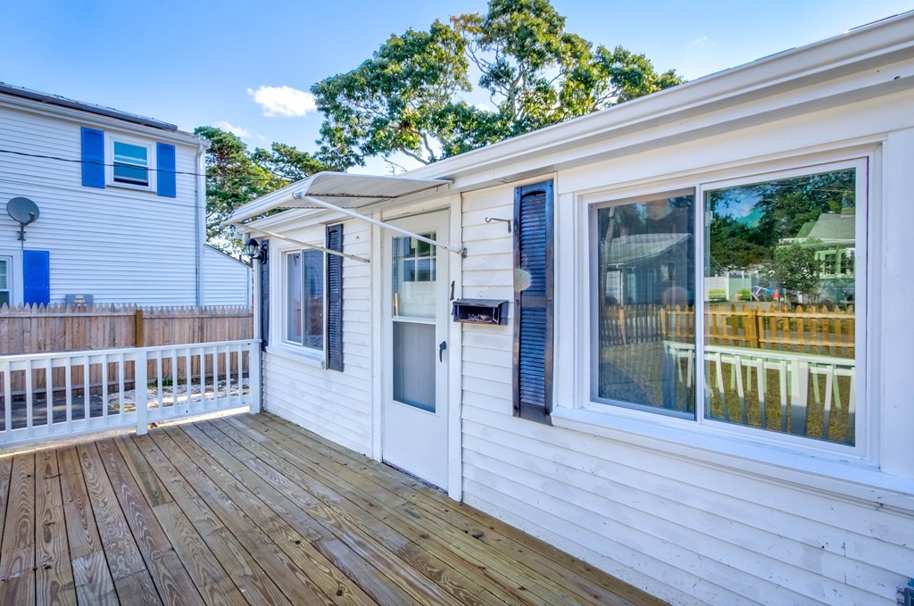 14 Pinehurst Drive Wareham, MA 02571 - Photo 5 of 39 a view of a house with a deck