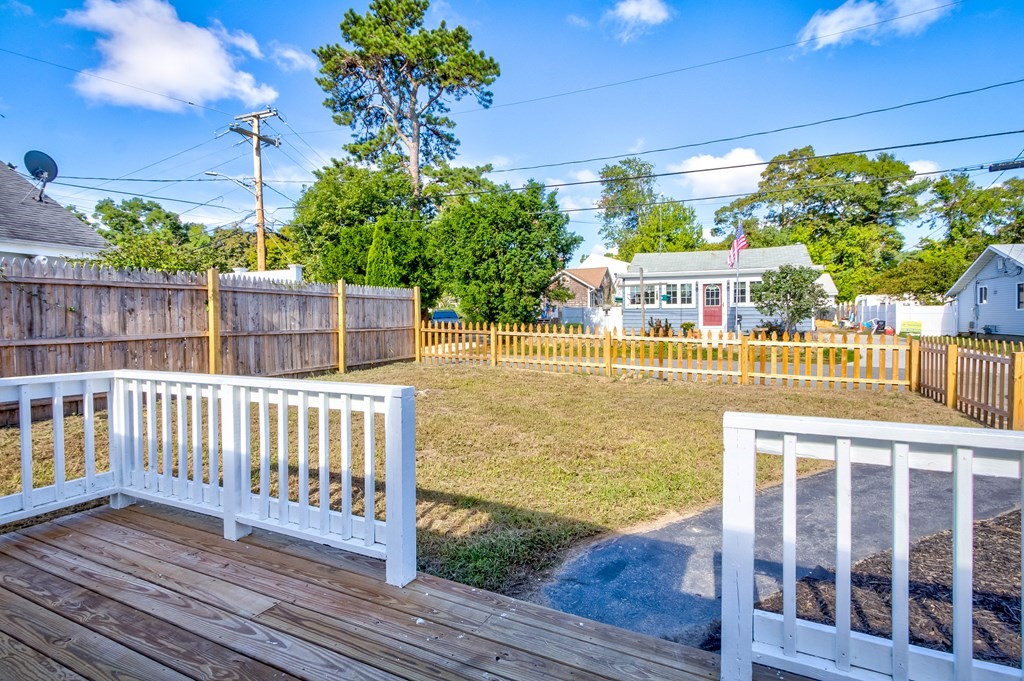 14 Pinehurst Drive Wareham, MA 02571 - Photo 6 of 39 a balcony with wooden floor and outdoor space