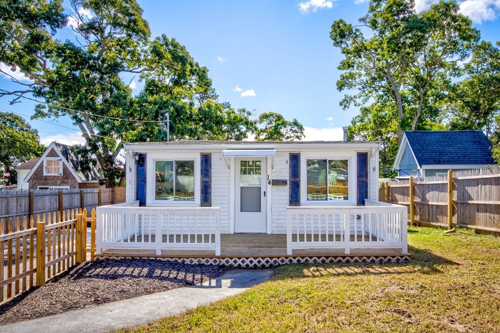 14 Pinehurst Drive Wareham, MA 02571 - Photo 7 of 39 front view of a house with a small yard