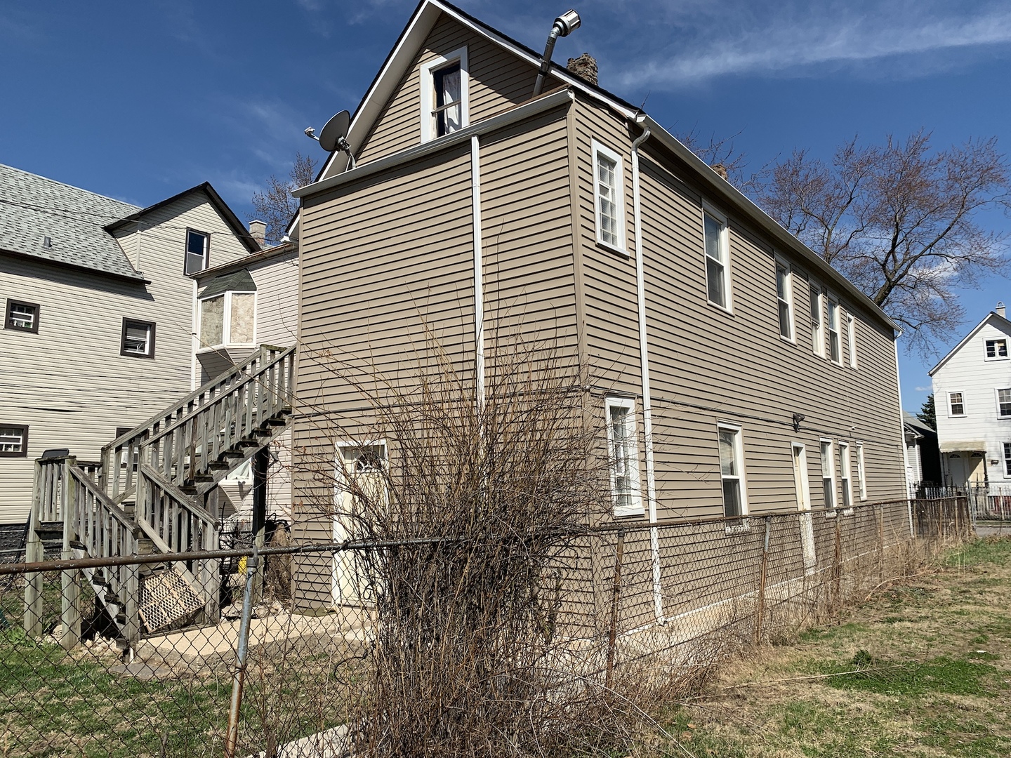 317 East 116th Street Chicago, IL 60628 - Photo 2 of 17 a view of a house with a yard