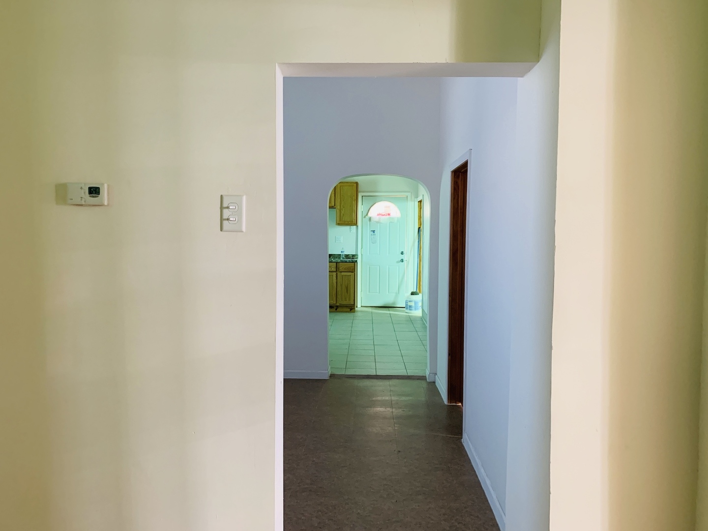 317 East 116th Street Chicago, IL 60628 - Photo 13 of 17 a view of a hallway with wooden floor