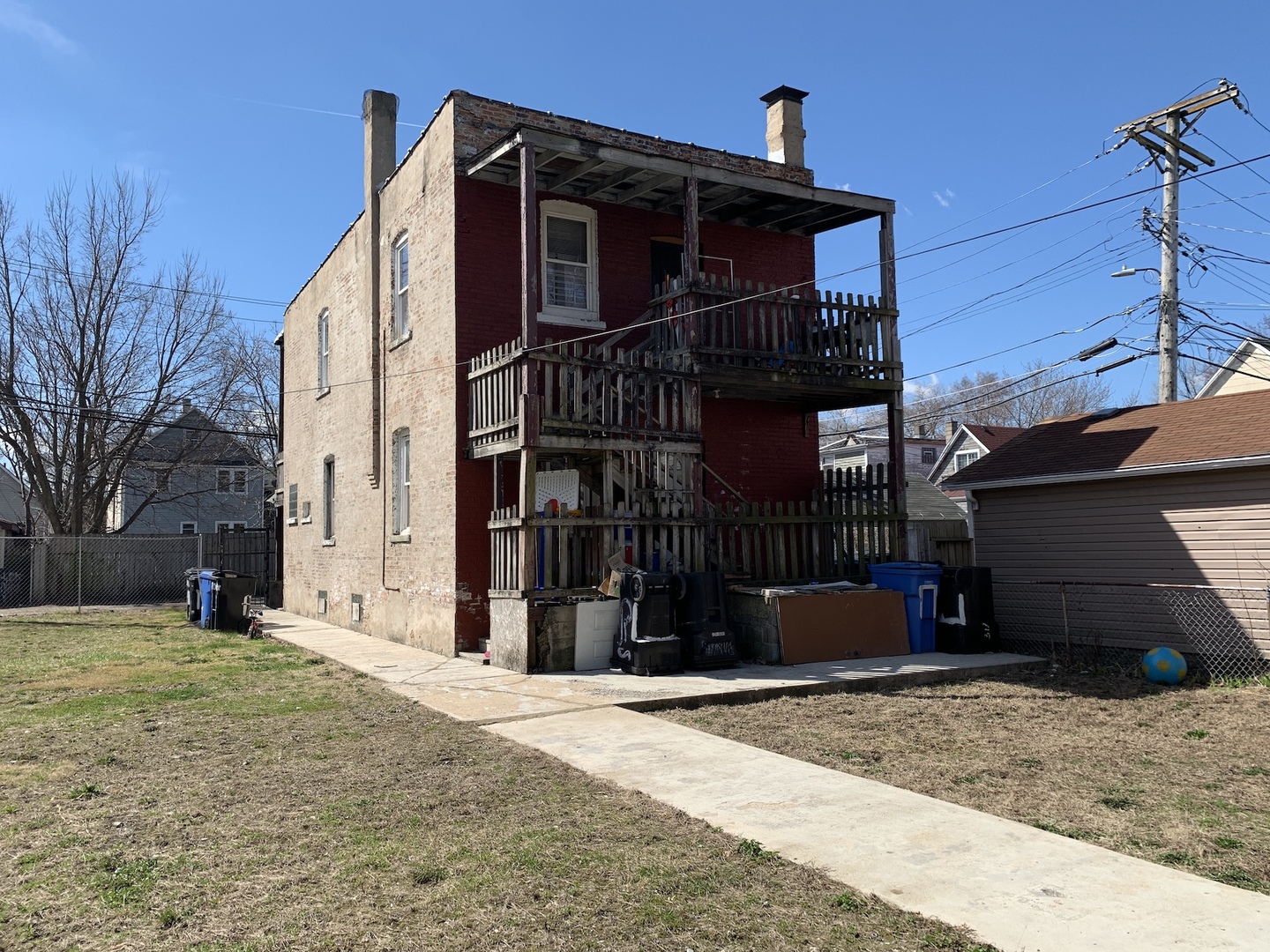 317 East 116th Street Chicago, IL 60628 - Photo 4 of 17 a view of a house with a yard