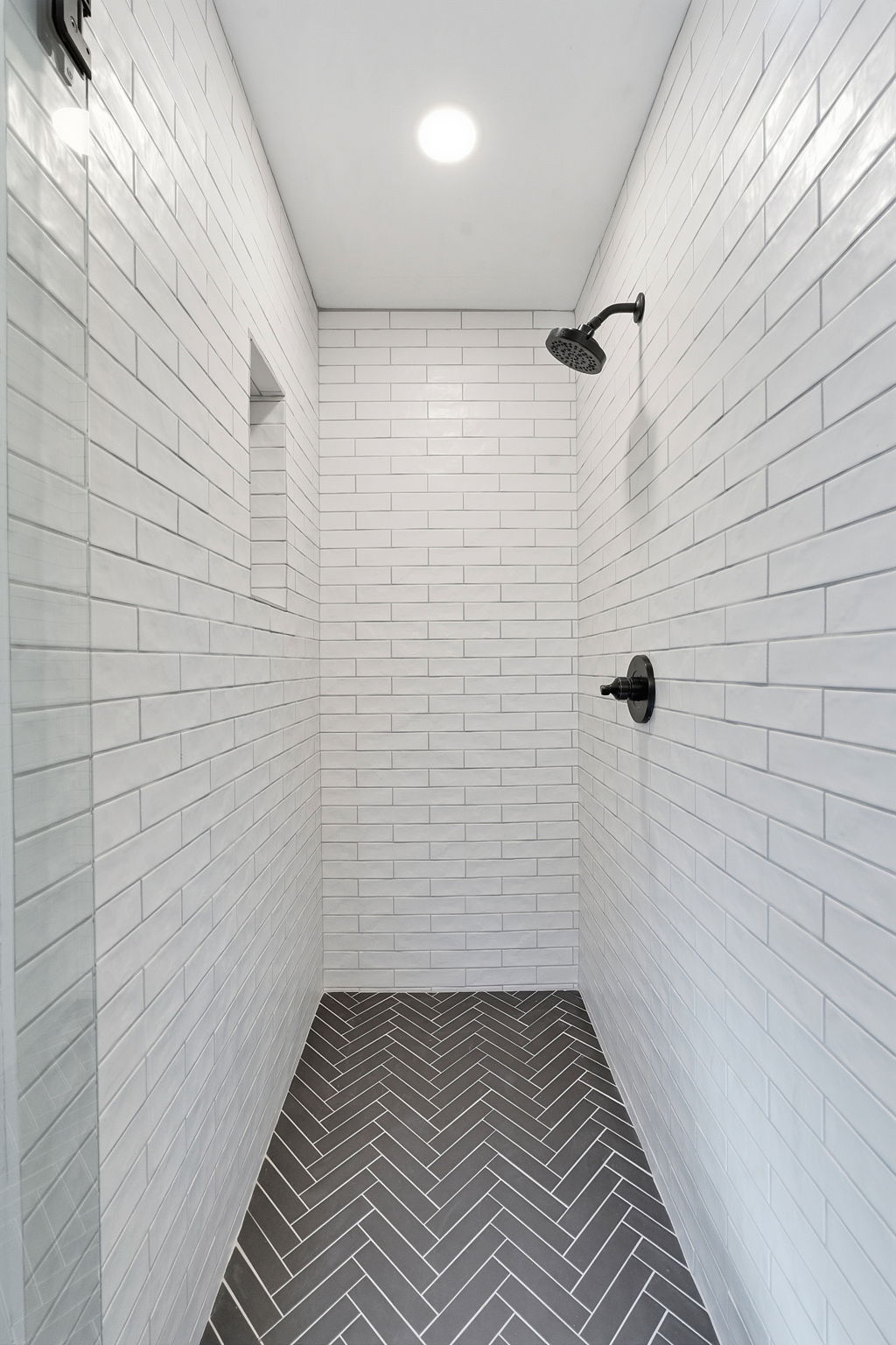 5609 Mapleleaf Drive Austin, TX 78723 - Photo 12 of 19 Full bathroom with a tile shower