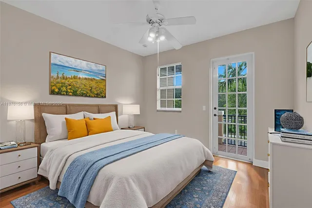 a bedroom with bed and a window