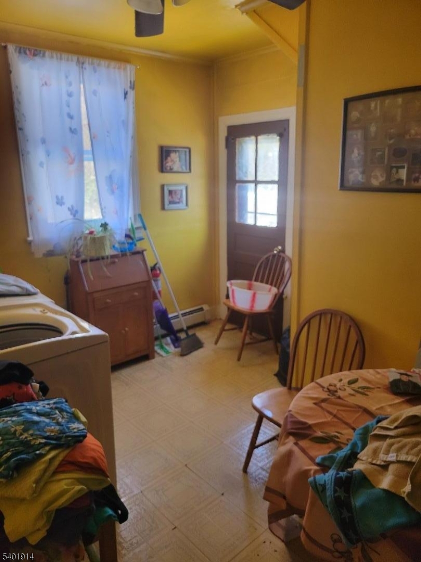 425 Main Street West Orange, NJ 07052 - Photo 14 of 20 a bedroom with furniture and a window