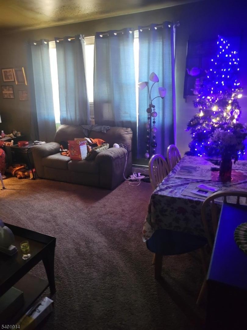 425 Main Street West Orange, NJ 07052 - Photo 19 of 20 a bedroom with a bed and a mirror